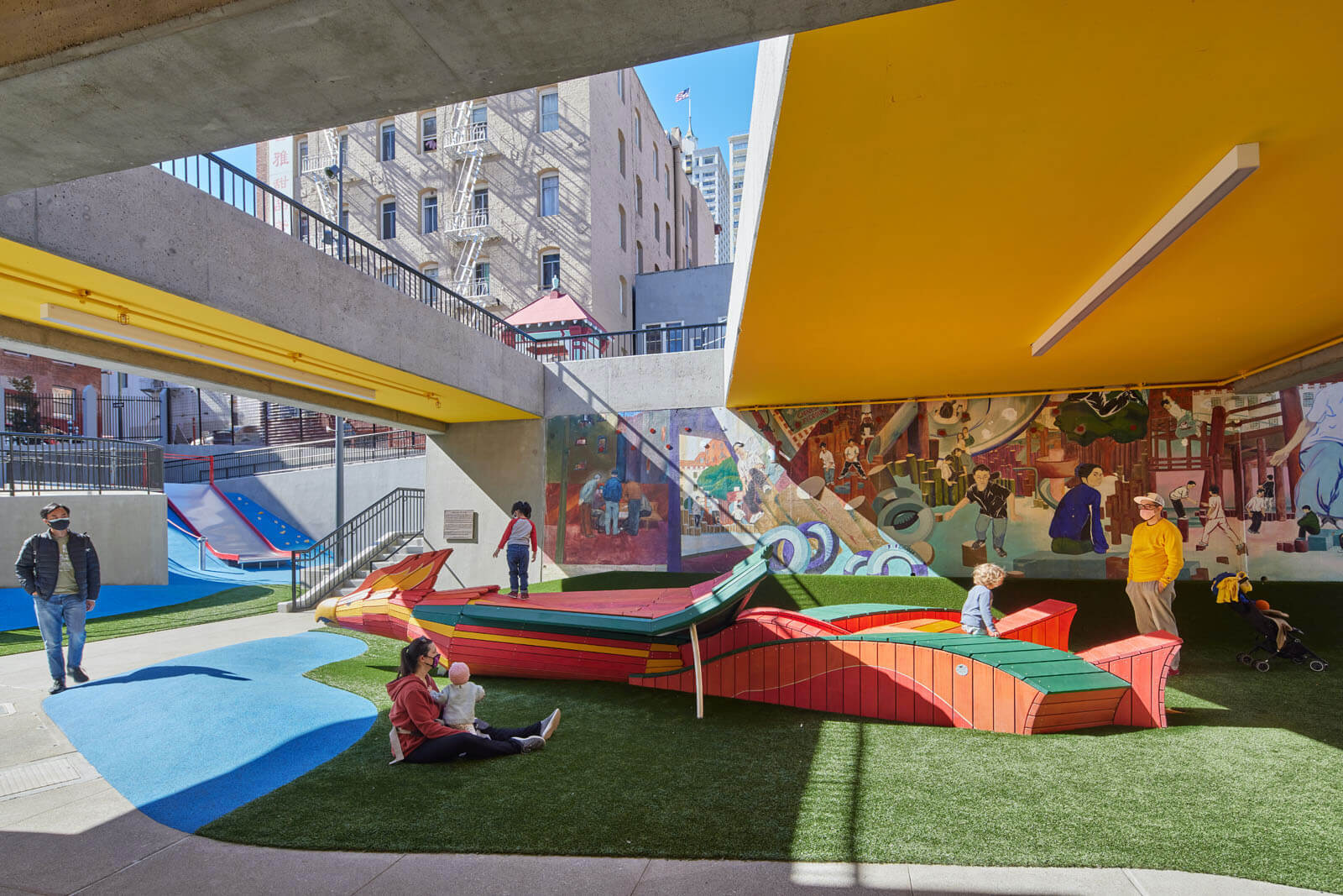 a vibrant playscape with a slide