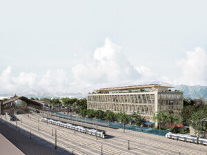 exterior rendering of a mixed-use building next to a rail yard
