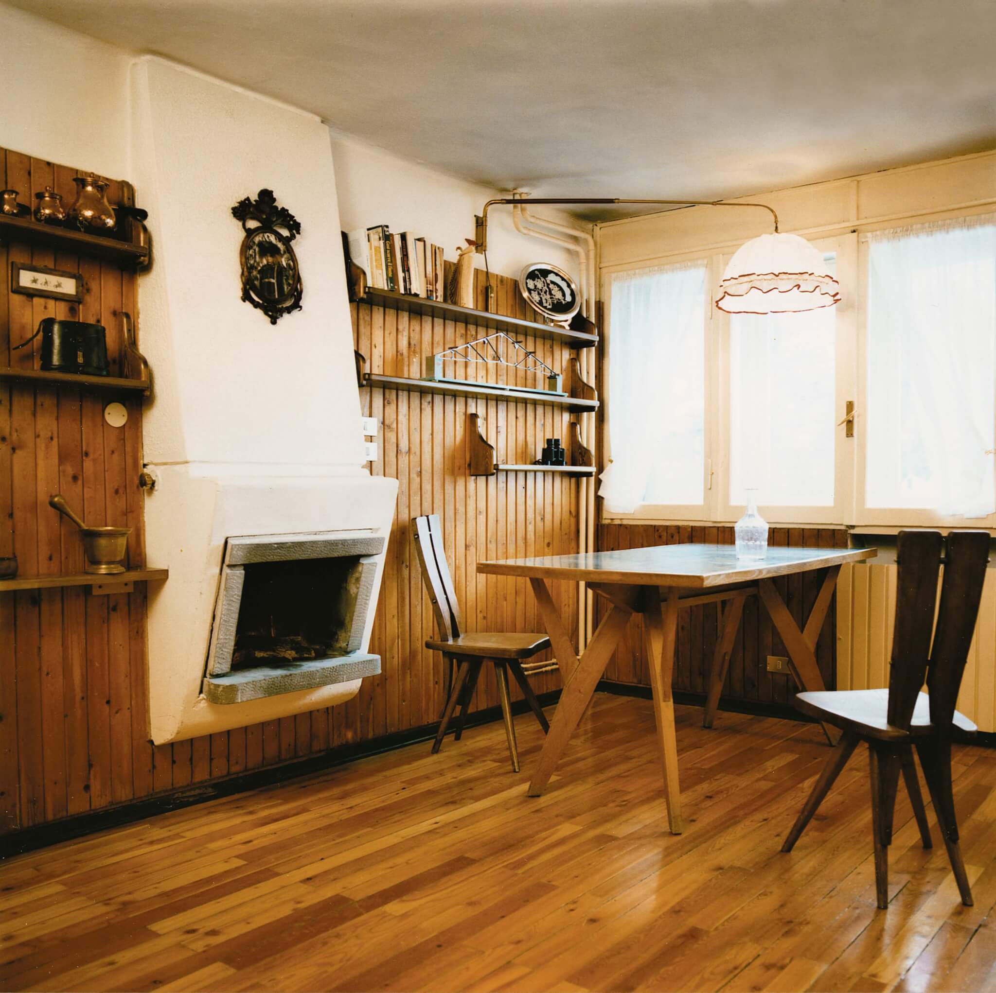 interior wood floor with shelves and table