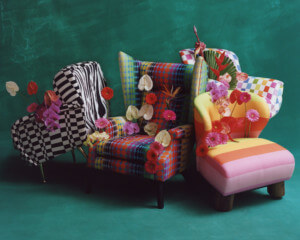 colorfully upholstered chairs with decorative flowers