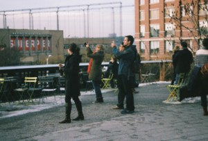 people taking photos on the high line
