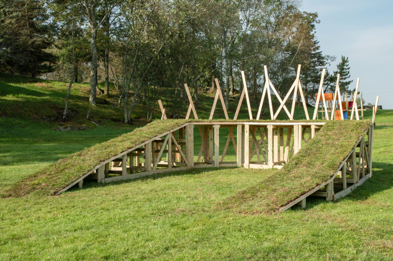 grassy slope with wooden frame