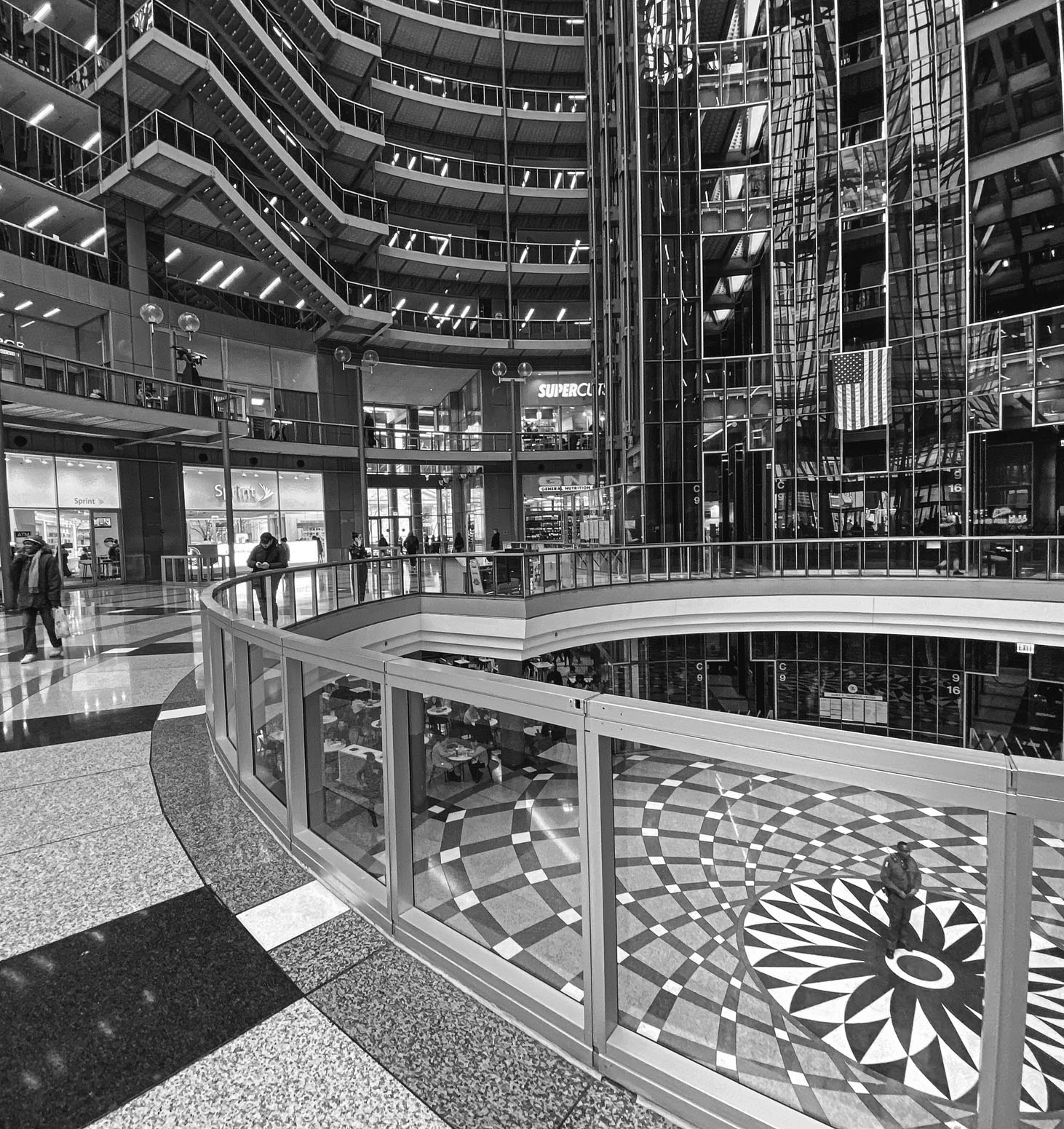 black and white shot of the thompson center atrium in chicago 