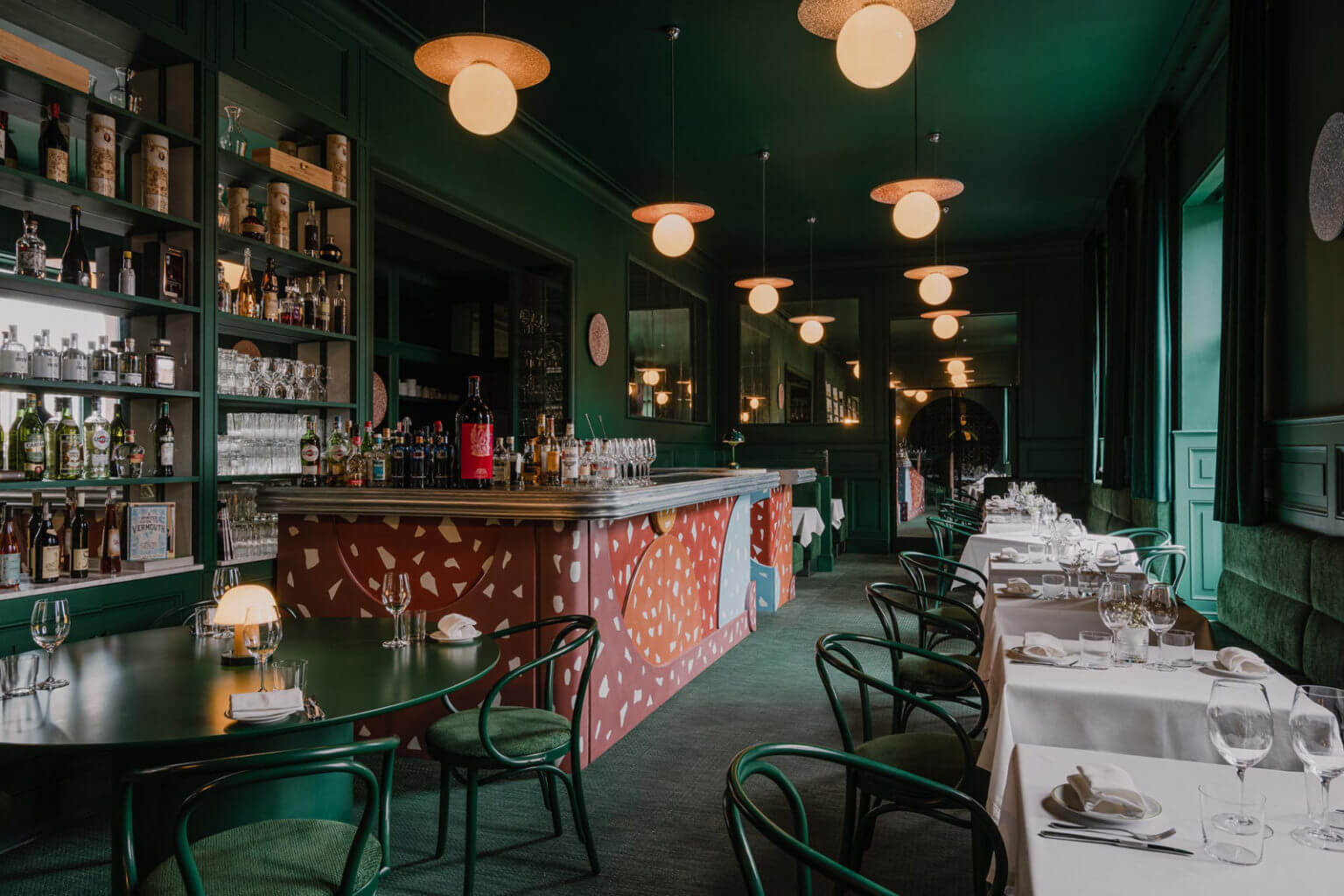 restaurant bar with green interiors