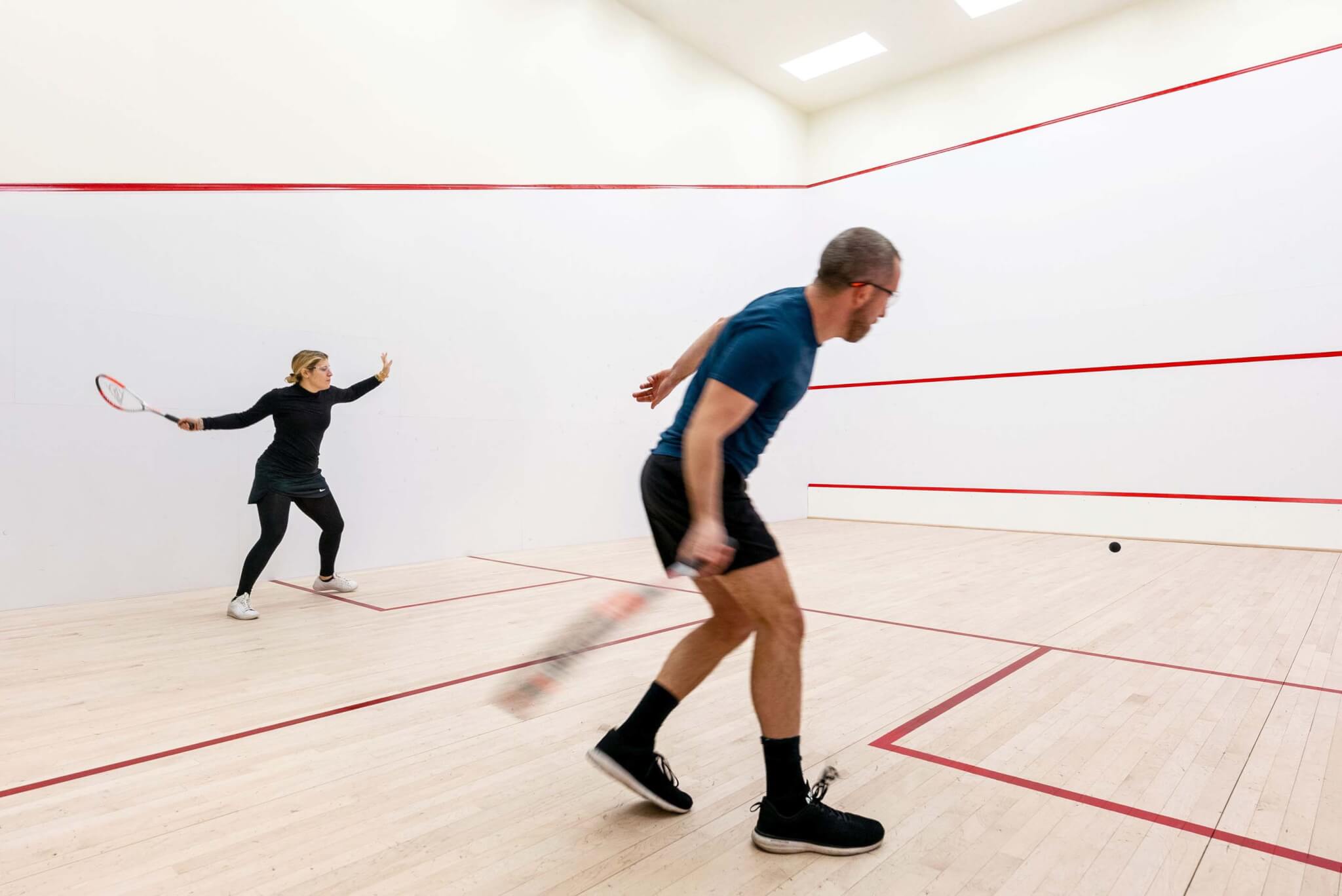 people playing squash