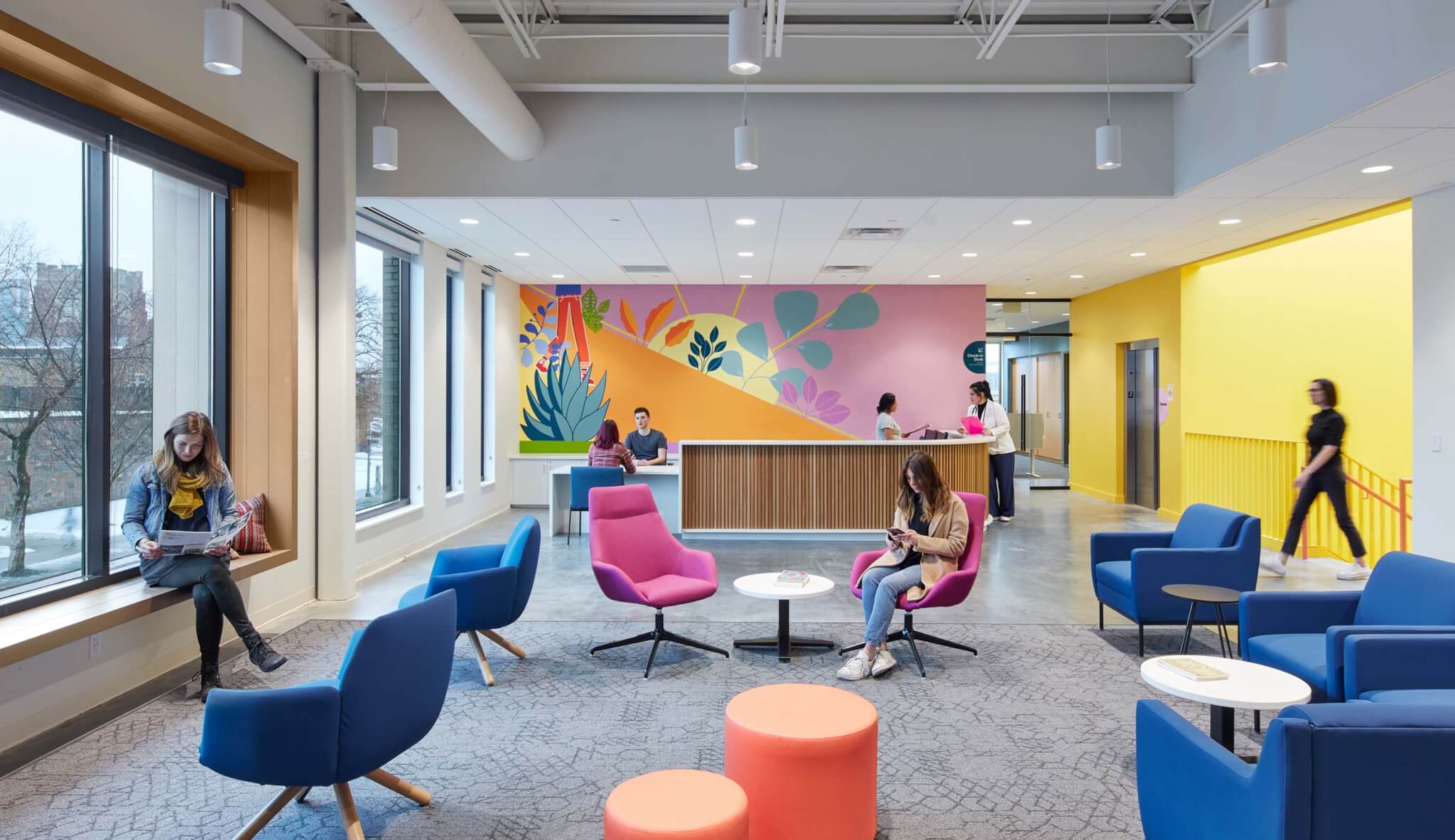 waiting area with colorful chairs and tables