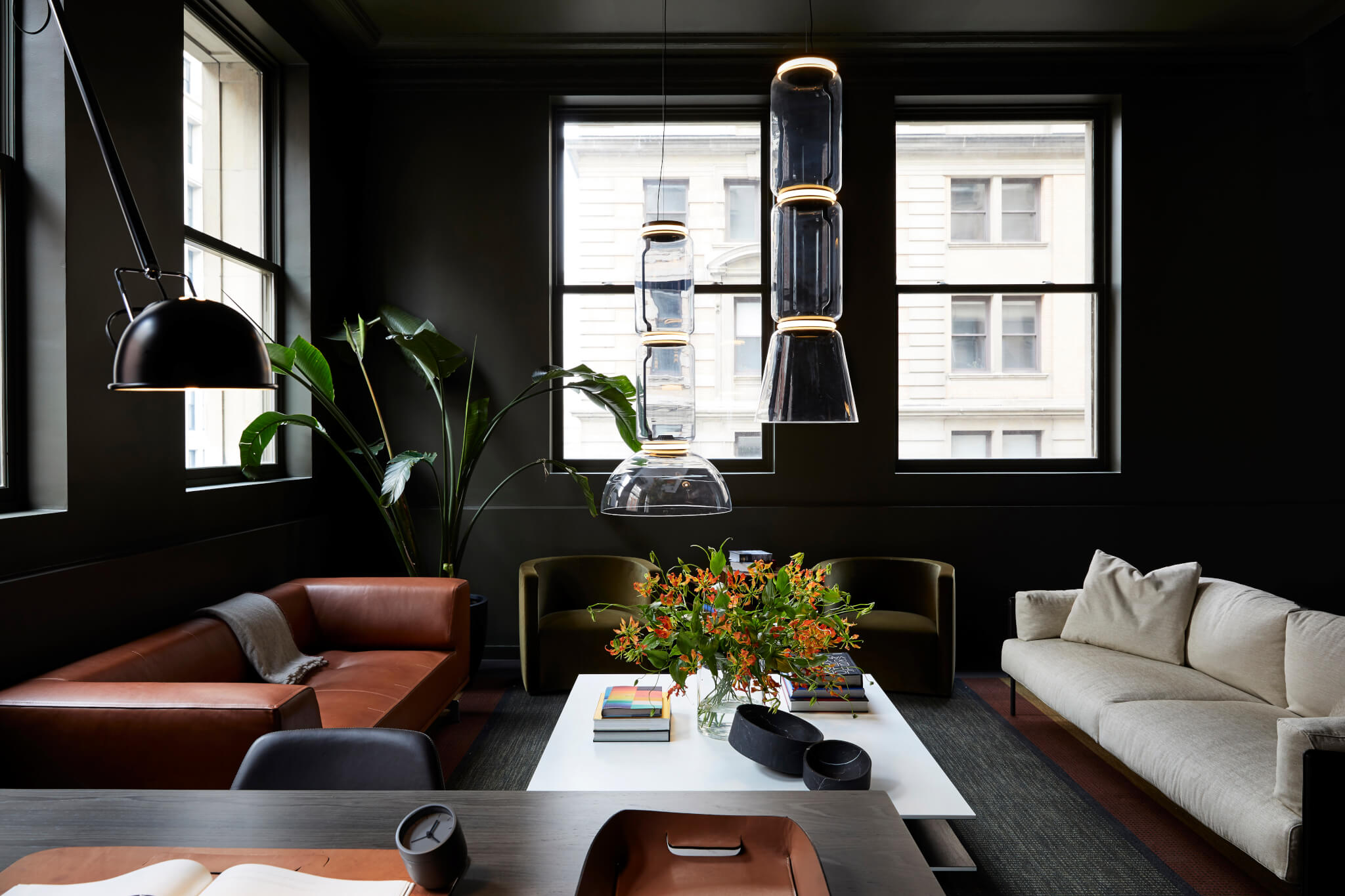 dark painted walls with leather furnishings