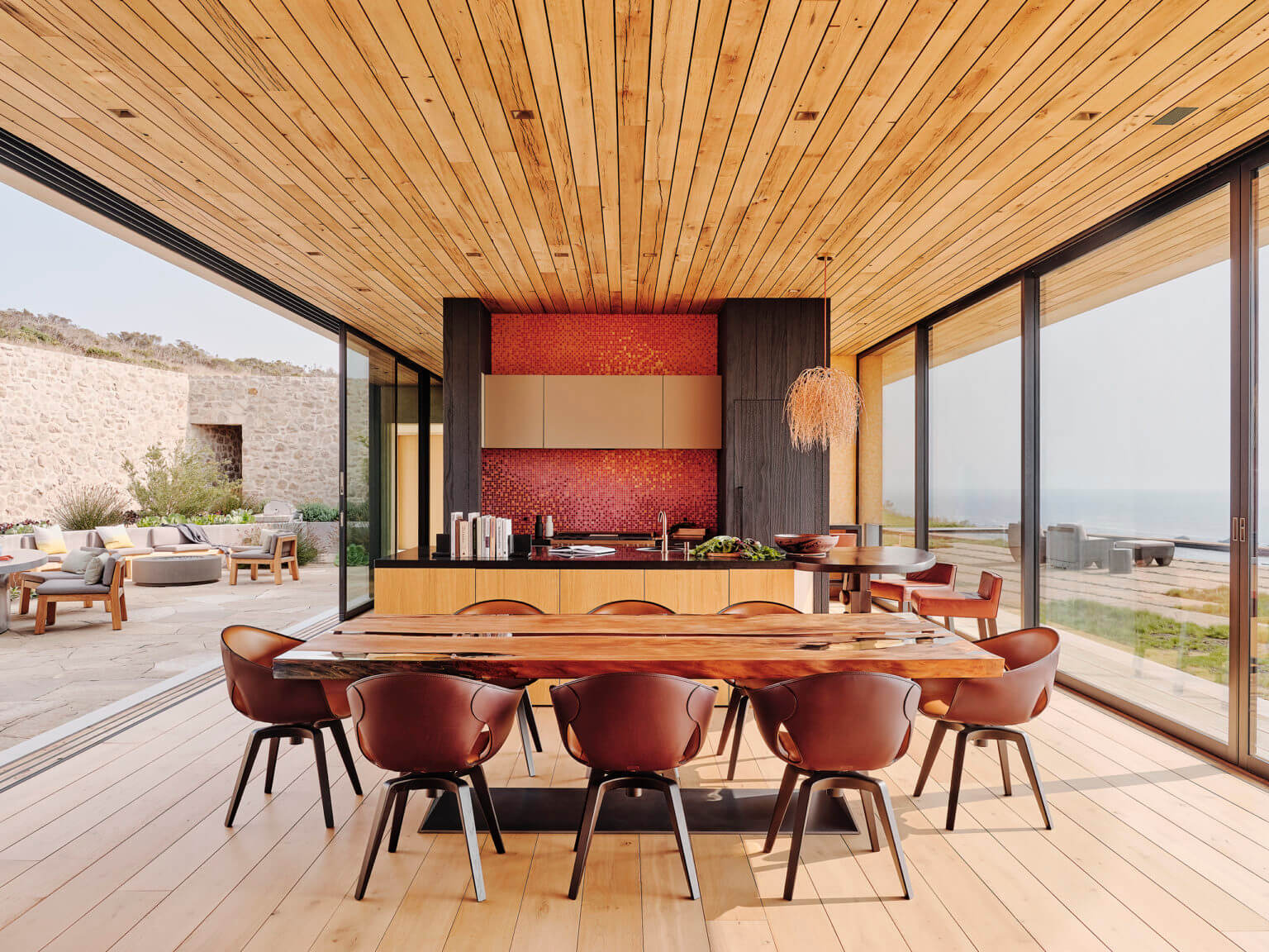 dining furniture under wood paneled ceiling
