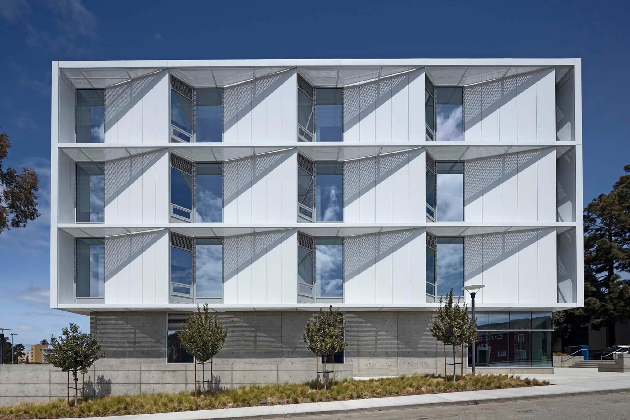 white aluminum facade panels with shades