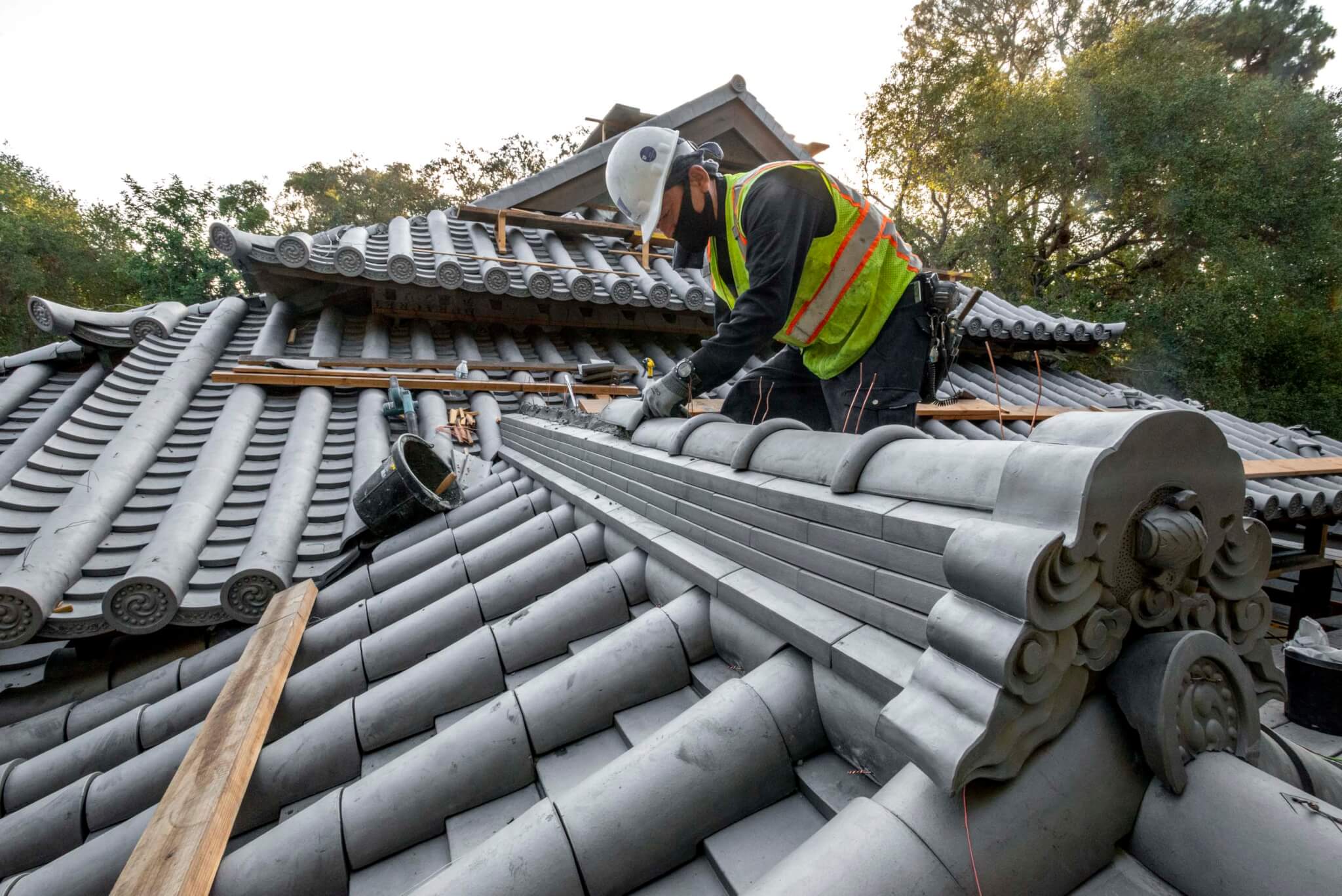 working on roof tiles at huntington library