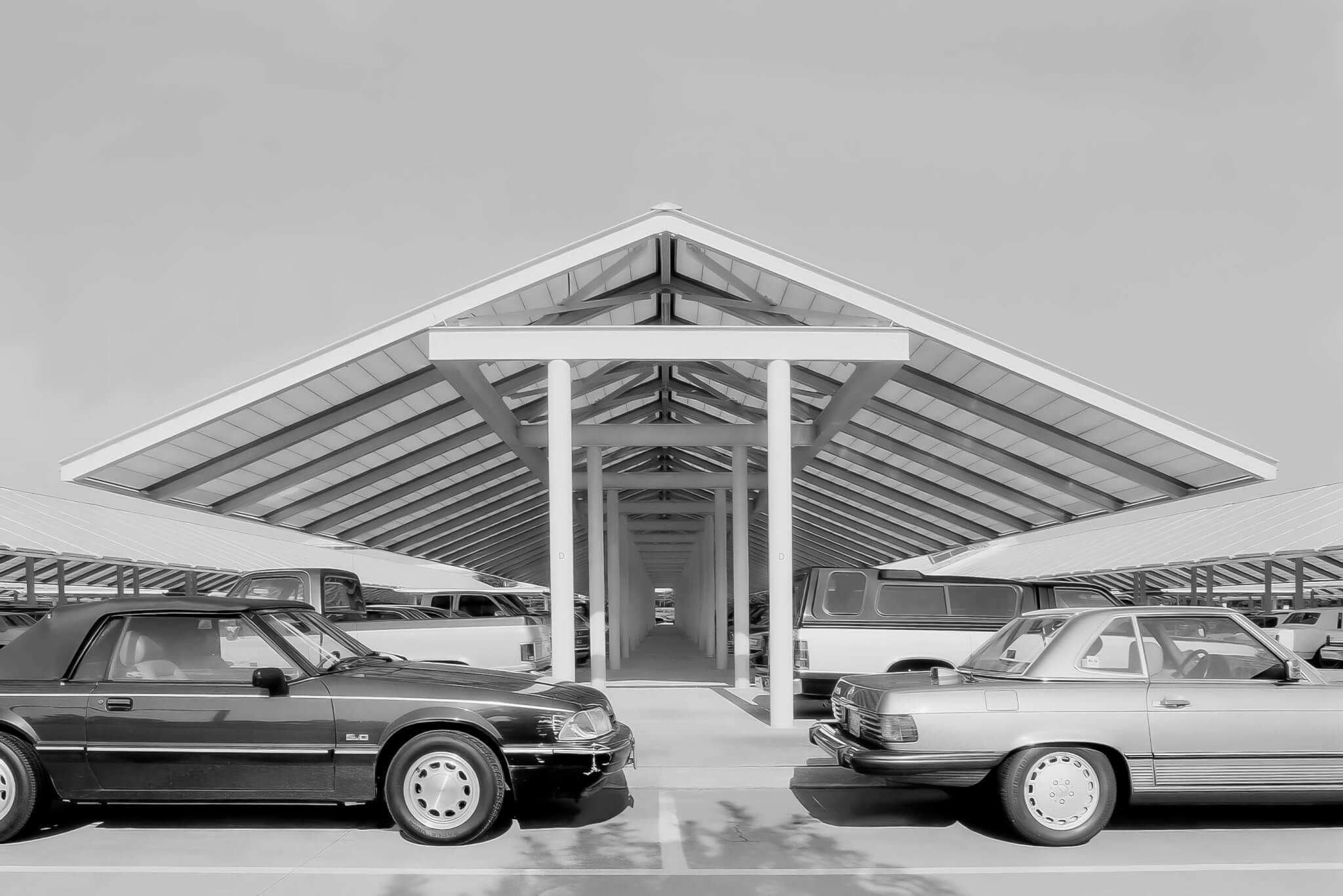 black and white photo of car canopy
