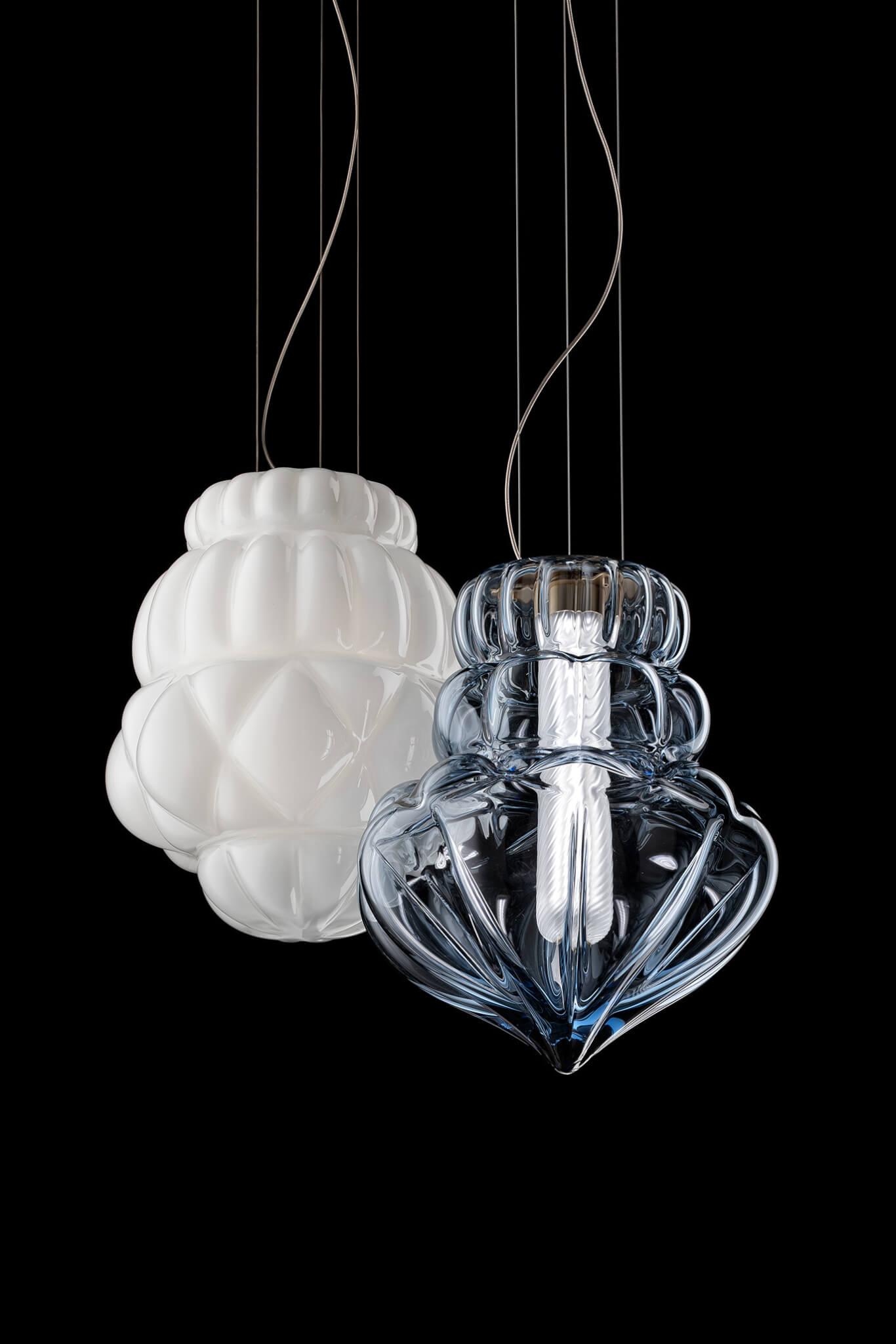 two light fixtures on translucent one transparent