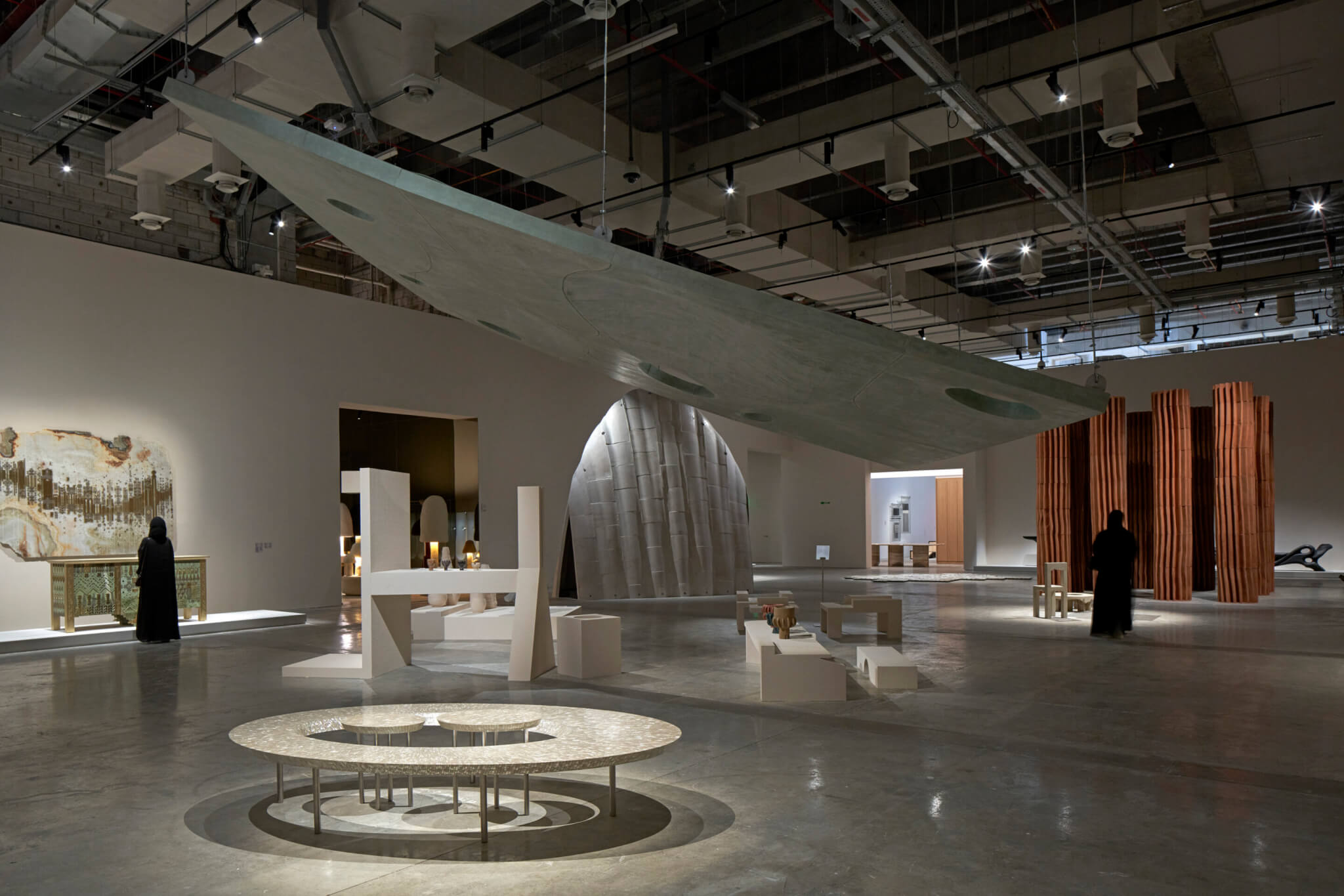 installation view of Arab Design Now showing sculptures and hanging art works