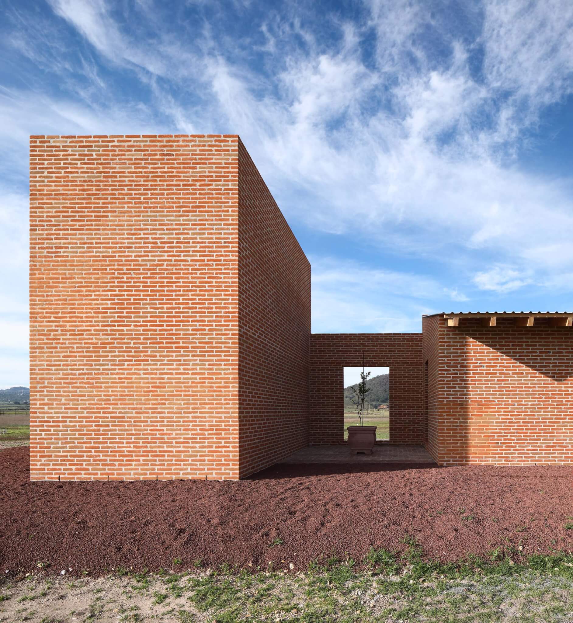 brick house in field