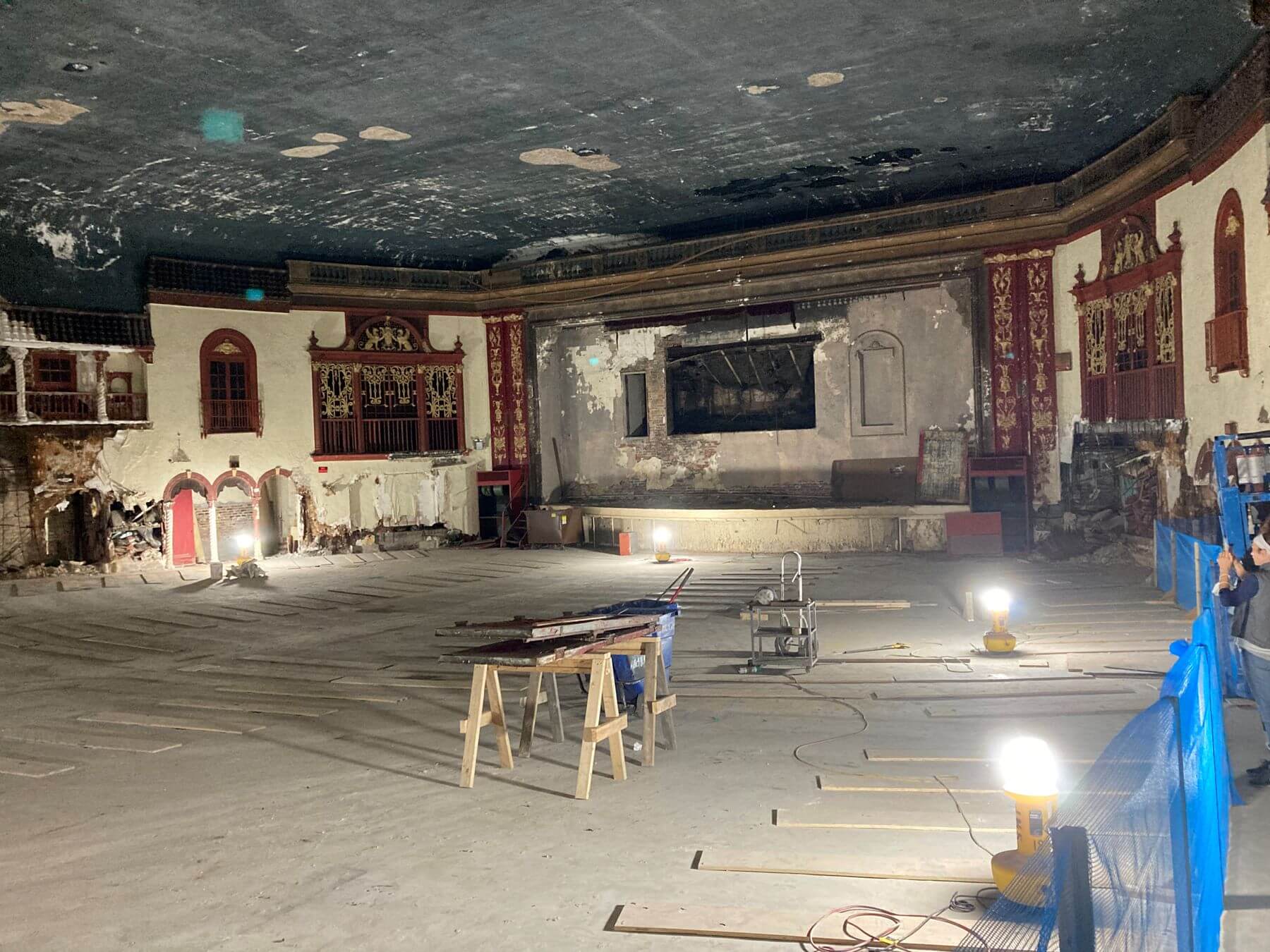 Interior of a theatre in state of disrepair.