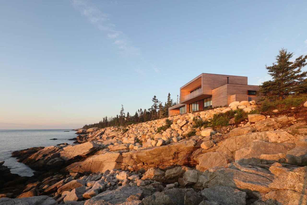 house perched on rocky cliff