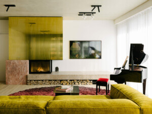 living room with fireplace in by Ester Bruzkus
