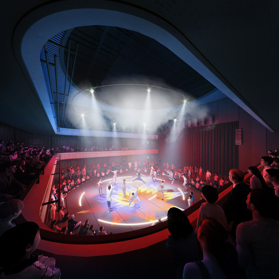 view of theater in Arts Commons with red and blue during a performance