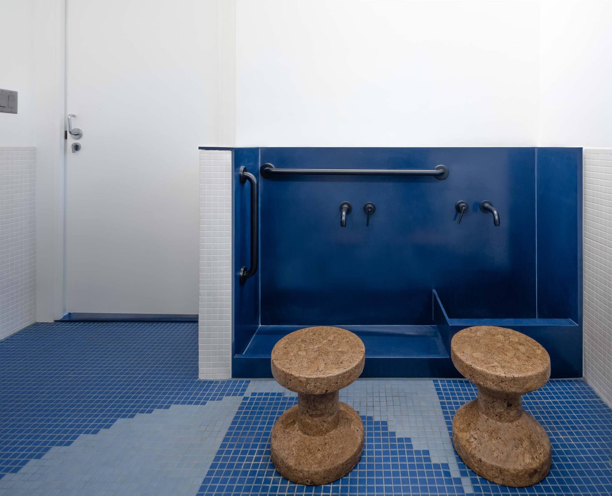ablution sink with blue tiles