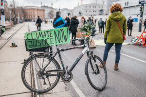 bike with sign for climate justice