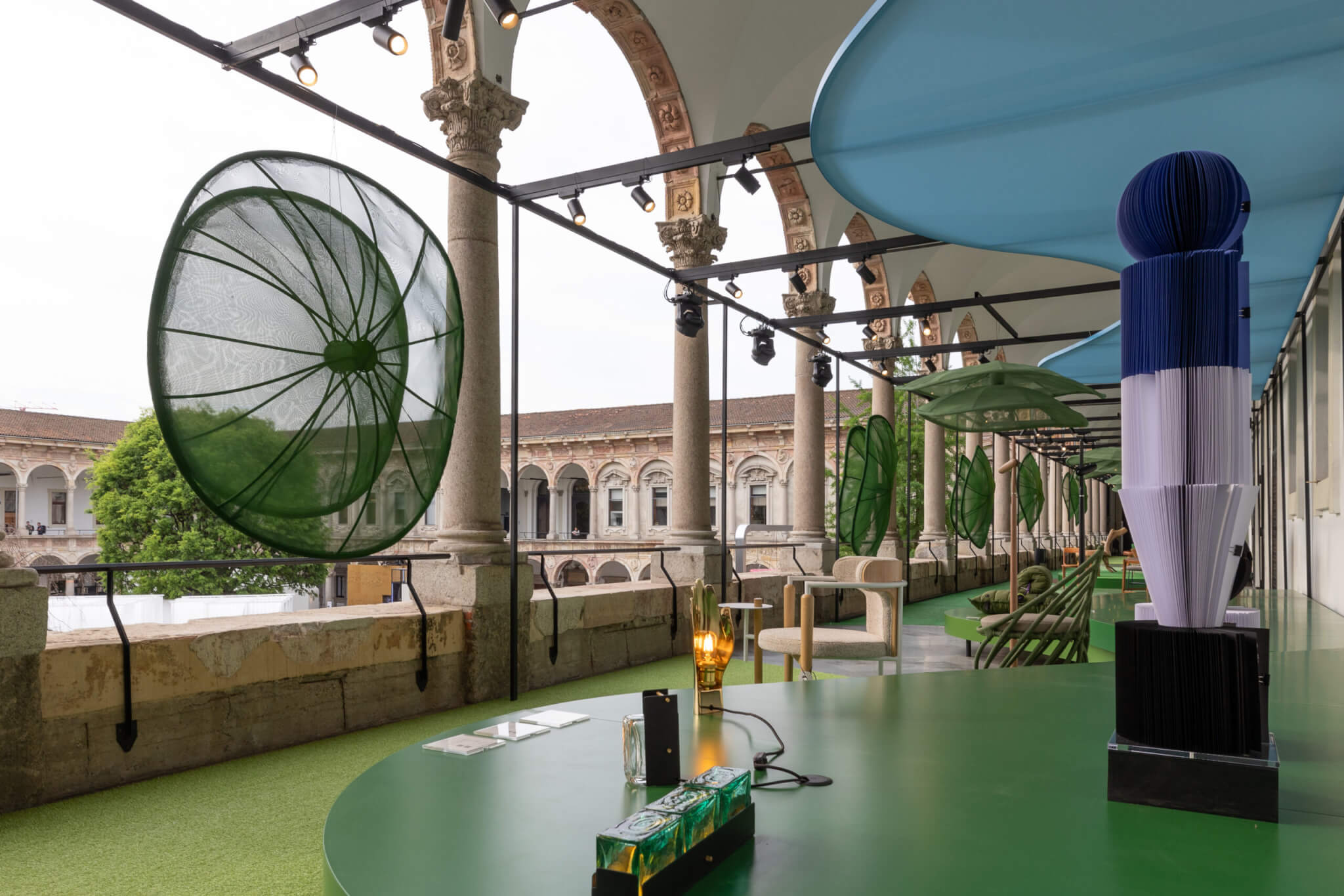 design objects on view on green loggia
