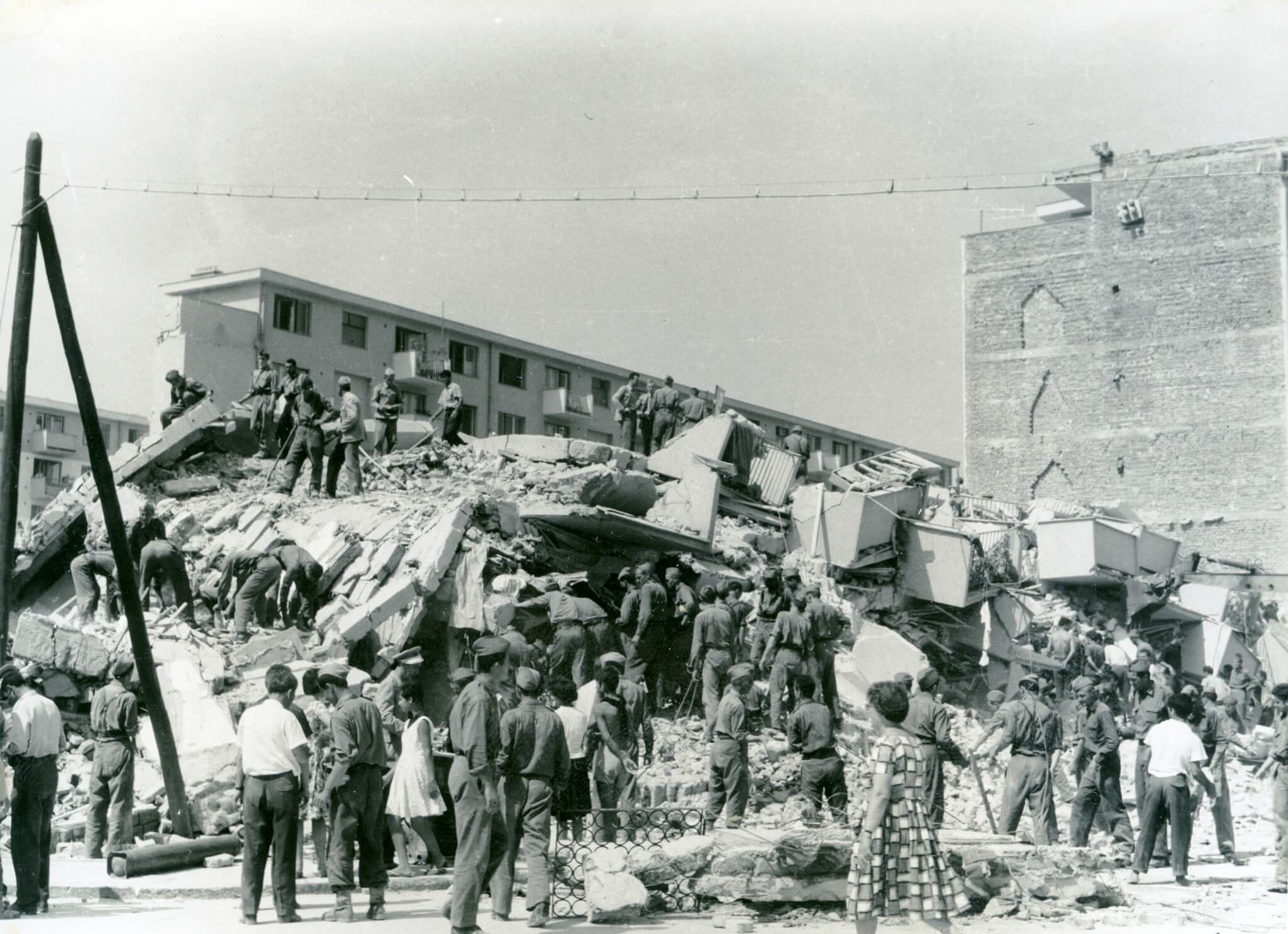 a black and white image of earthquake rubble