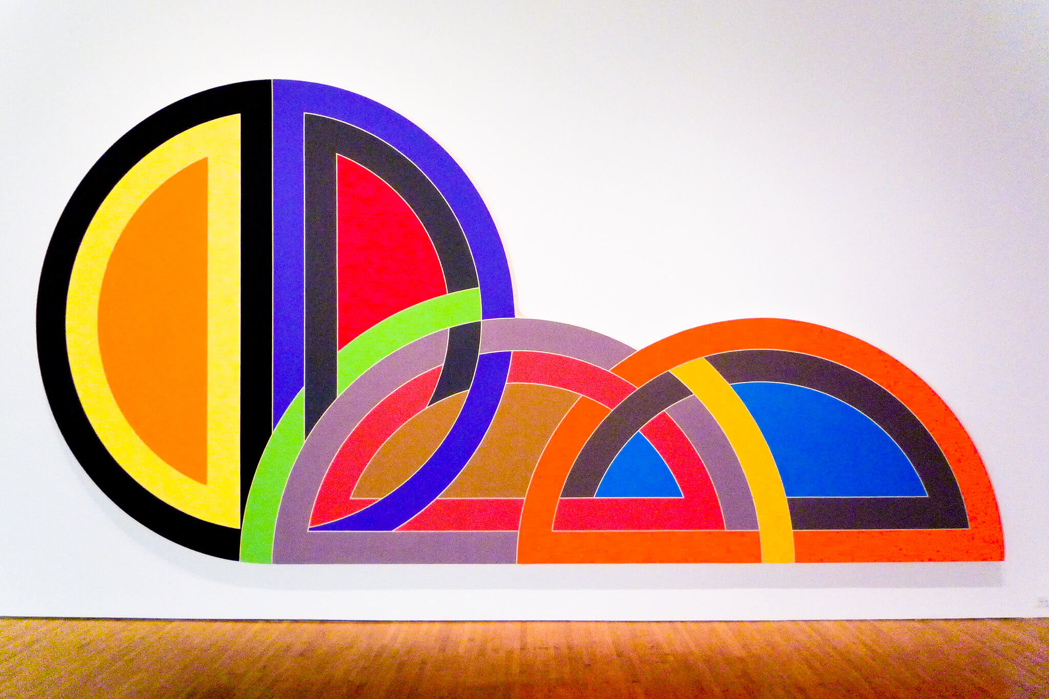 colorful wall art by Frank stella