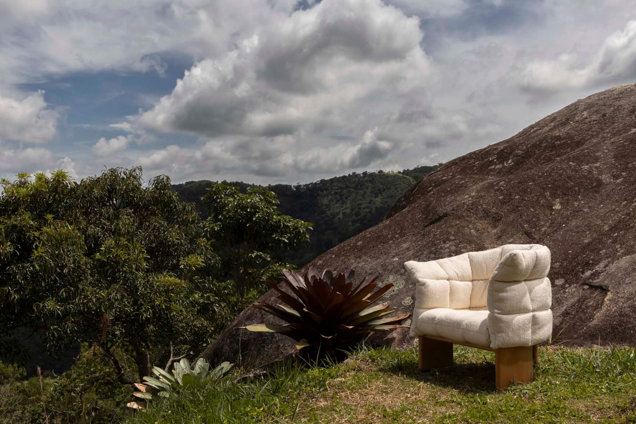 chair with a hilly backdrop